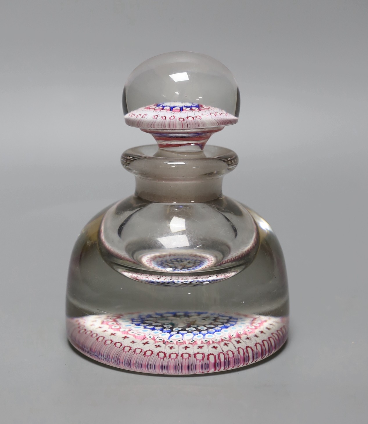 A concentric millefiori glass inkwell and stopper, ‘1848’ cane but later, 15cms high